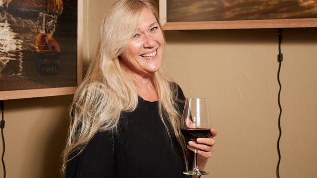 Relieved is owner Marie Hart, enjoying a glass of wine at Mischief and Mayhem Wine Lounge in Glenelg South. Picture: Matt Loxton.