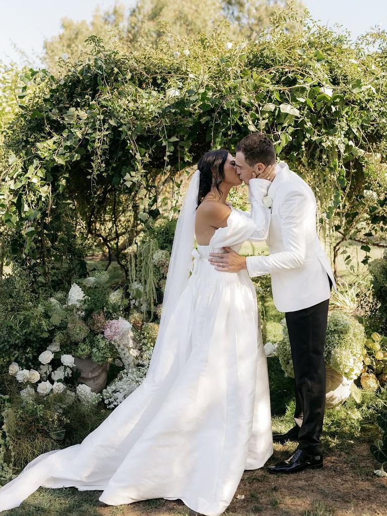Jeremy Cameron and Indiana Putra shared a photo of their wedding on Instagram.