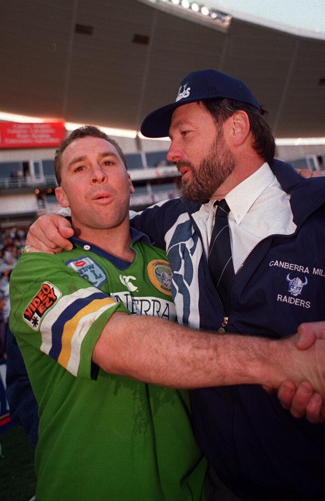 Stuart and with Raiders coach Tim Sheens after defeating Canterbury in 1994.