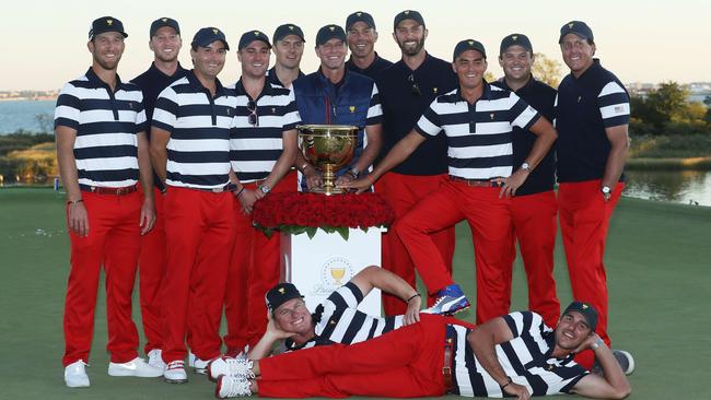The US team celebrates with the trophy. Picture: Getty