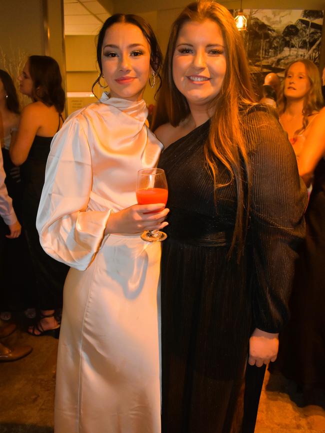 Naomi Gilmore and Tara Whelan having a great night at the Cowwarr Saints Football &amp; Netball Club Golden Gala Ball 2024. Picture: Jack Colantuono