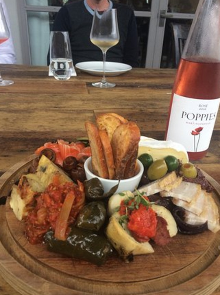 You can enjoy a platter and some wine surrounded by the vineyards.