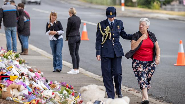 A representative of the governor walks beside Devonport Mayor Annette Rockliff at the memorial site. Picture: Jason Edwards