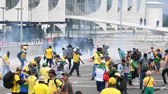 Supporters pushed through police barricades and stormed into the national congress. Picture: AFP.