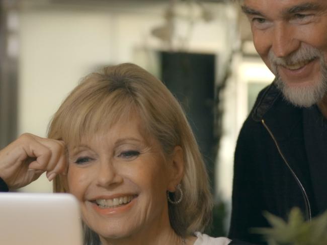 Olivia Newton-John and husband, founder and chairman of Amazon Herb Company John Easterling in High As Mike.