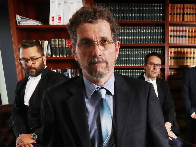 Former JCU climate scientist Peter Ridd preparing with his legal team barrister Benjamin Kidston, barrister Benjamin Jellis, lawyer Mitchell Downes, lawyer Amelia Hasson, and QC Stuart Wood, on last day of a Federal Court hearing, John Jarrard Chambers, Brisbane. Mr Ridd claims he was unfairly dismissed from his job with the university for publicly voicing his opinions on climate change and coral bleaching which contradicted his colleaguesÕ research. Photographer: Liam Kidston. NO BYLINE.