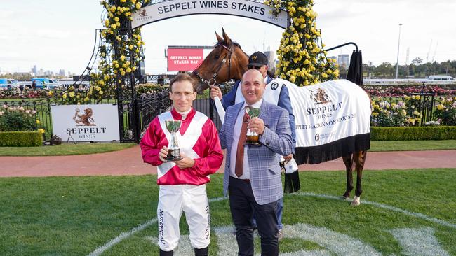 Luke Currie and Trainer Grant Williams with Arcadia Queen after winning the Mackinnon Stakes at Flemington. Picture: Scott Barbour—Racing Photos via Getty Images.