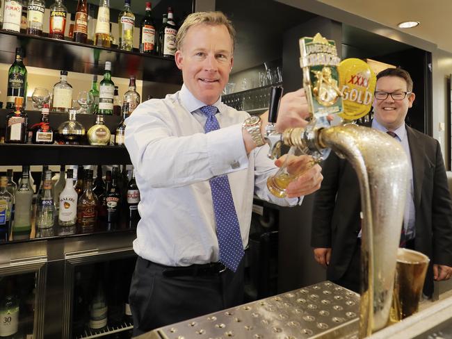 Will Hodgman pours a drink at the Salamanca Inn. Premier, Will Hodgman, and the Minister for State Growth, Matthew Groom, will launch a training initiative to help boost skills in the hospitality industry. Picture: RICHARD JUPE