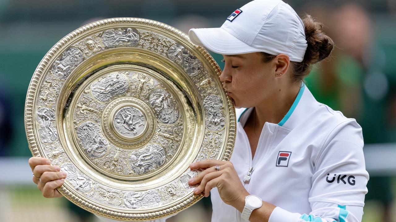 Ashleigh Barty gives her Wimbledon trophy a kiss after winning the women’s singles final match against Karolina Pliskova. Picture: Getty Images
