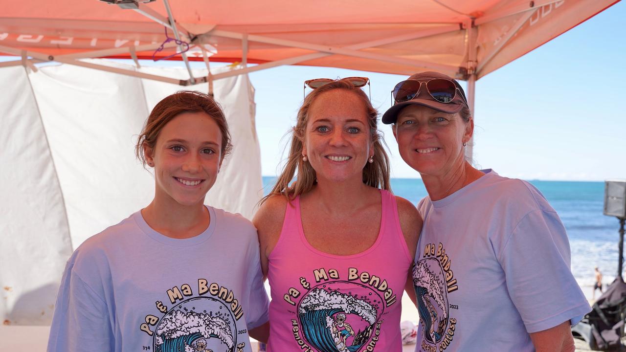 Mae Clarke, 12, Tracy Belyea and Sue Shipman from the Windansea Boardriders Club at the 49th Annual Pa &amp; Ma Bendall Memorial Surfing Contest held at Moffat Beach in Caloundra on April 8, 2023. Picture: Katrina Lezaic