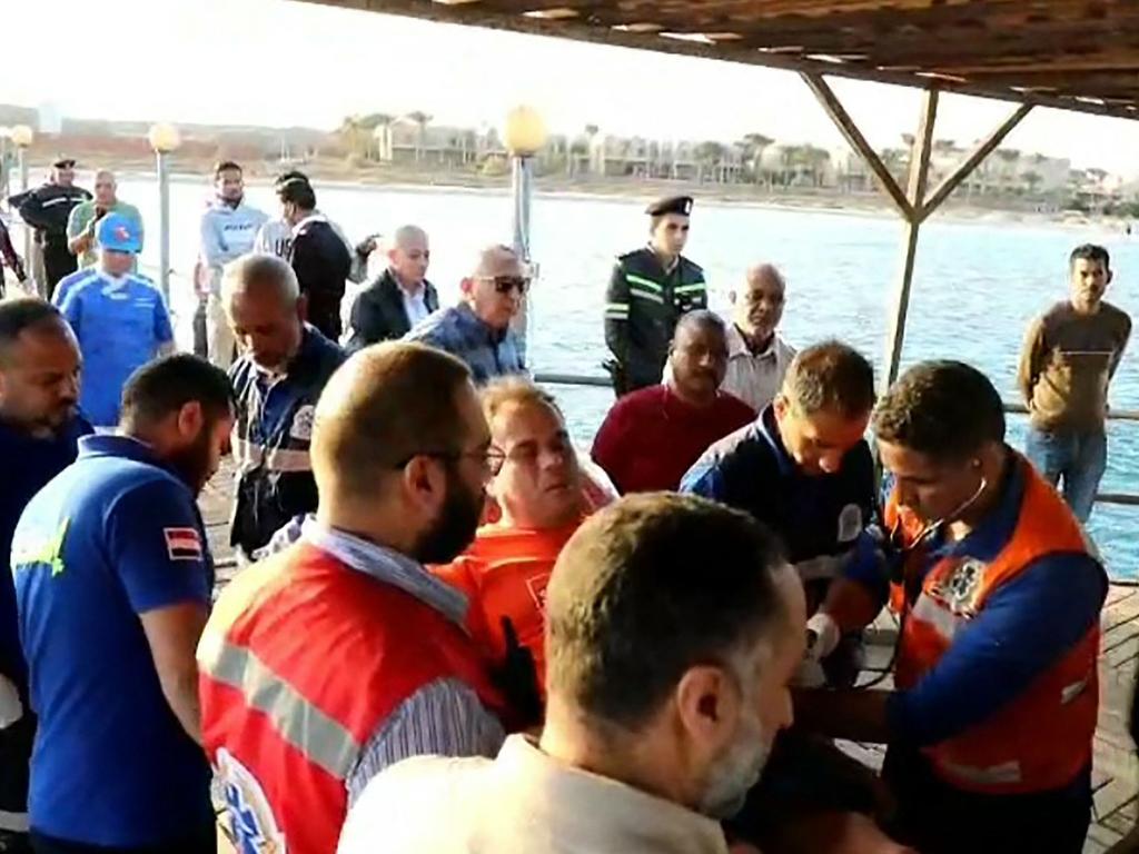 First-responders tending to a man on a stretcher in the Red Sea harbour town of Marsa Alam on November 25, 2024. Picture: Egyptian sis / AFP