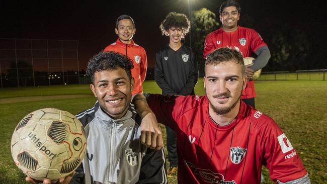 (Back from left) Umesh Rai, Nataniel Silva and Kavin Raj. (front from left) Adnan Alharoni and Chris Luscombe. Members of Willowburn football club. Picture: Nev Madsen.