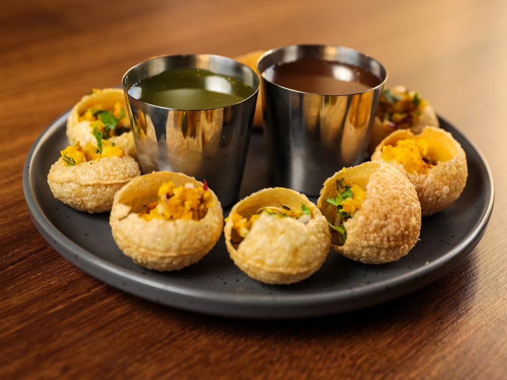 Pani Puri is one of many delicious snacks commonly sold by Indian street vendors. Picture: Mireille Merlet