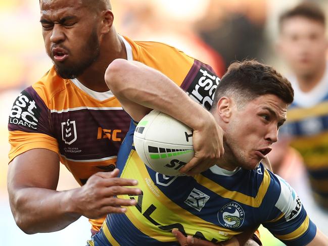 Mitchell Moses of the Eels is tackled by Payne Haas of the Broncos during the Second NRL Elimination Final between the Parramatta Eels and the Brisbane Broncos at Bankwest Stadium in Sydney, Sunday, September 15, 2019. (AAP Image/Brendon Thorne) NO ARCHIVING, EDITORIAL USE ONLY