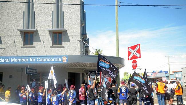 Protesters gather outside Landry's Denison St office. Picture: Jann Houley