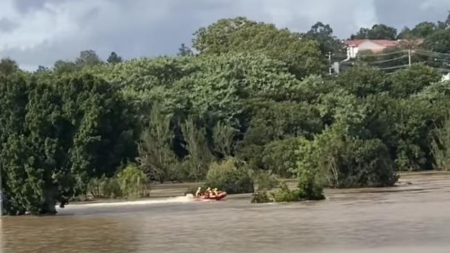 Rescue teams have been seen in the area after reports a woman went missing in floodwaters in West Ipswich. Picture: Brittany Nawani/Facebook