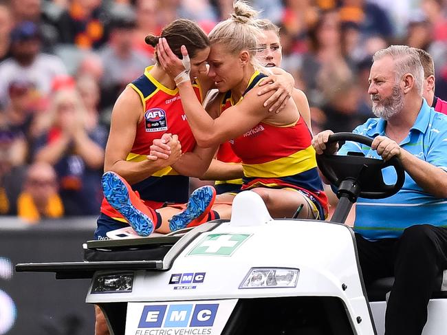 Crows co-captain Erin Phillips is driven off the ground after sustaining an injury during the AFLW Grand Final between Adelaide and Carlton. PHOTO: Daniel Kalisz/Getty Images