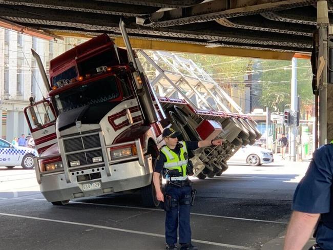 Truck wedged beneath bridge at Flinders St Station Melbourne. Picture: Victoria Police