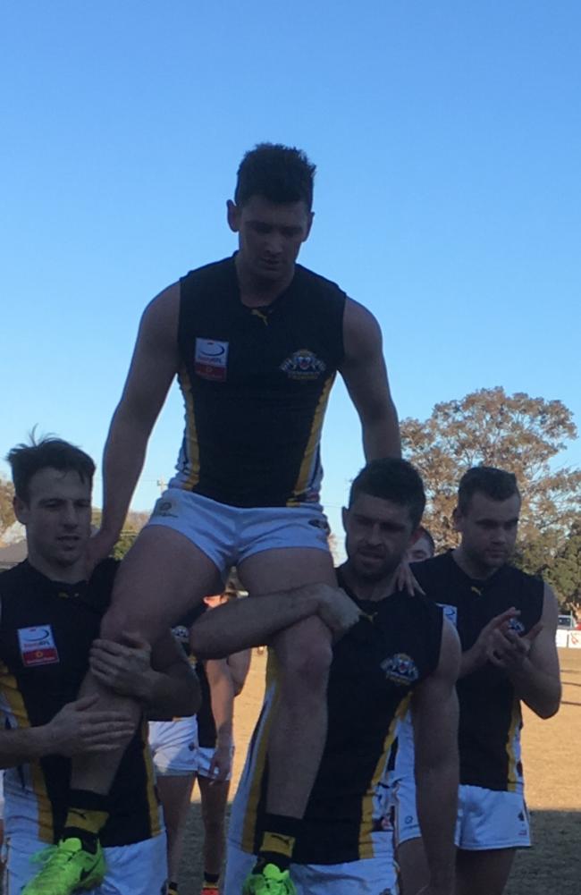 Balwyn's Tom Roach is carried off after retiring from football