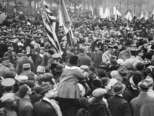 People in the streets of Paris, France, celebrate the signing of the Armistice that ended the fighting of WWI. Picture: AP