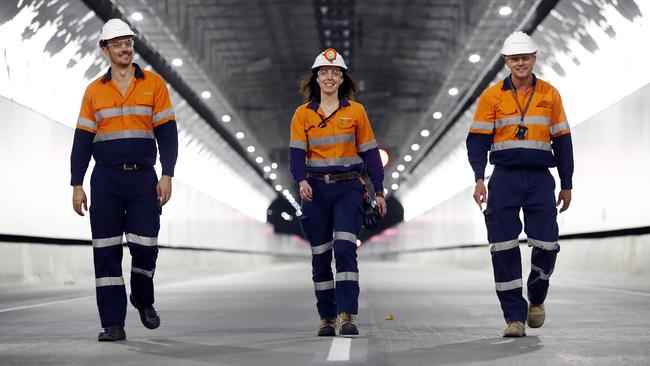 NorthConnex workers Timothy Nairne, left, Emma Clark ad Simon Tulloch in the new Sydney tunnel. According to the Wage Price Index, the seasonally adjusted price of labour only inched 0.2 per cent higher in the June quarter. Picture: Sam Ruttyn
