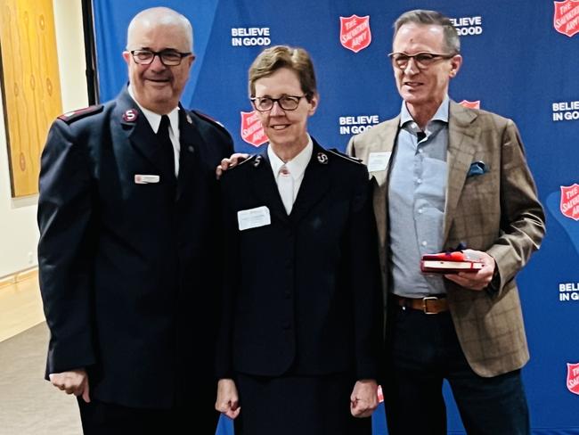 Salvation Army Major Mark Everitt, Commissioner Miriam Gluyas and Warren Ebert.