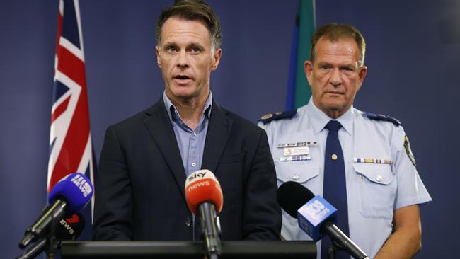 NSW Premier Chris Minns and deputy Commissioner David Hudson address the media on Wednesday afternoon. Picture: Richard Dobson