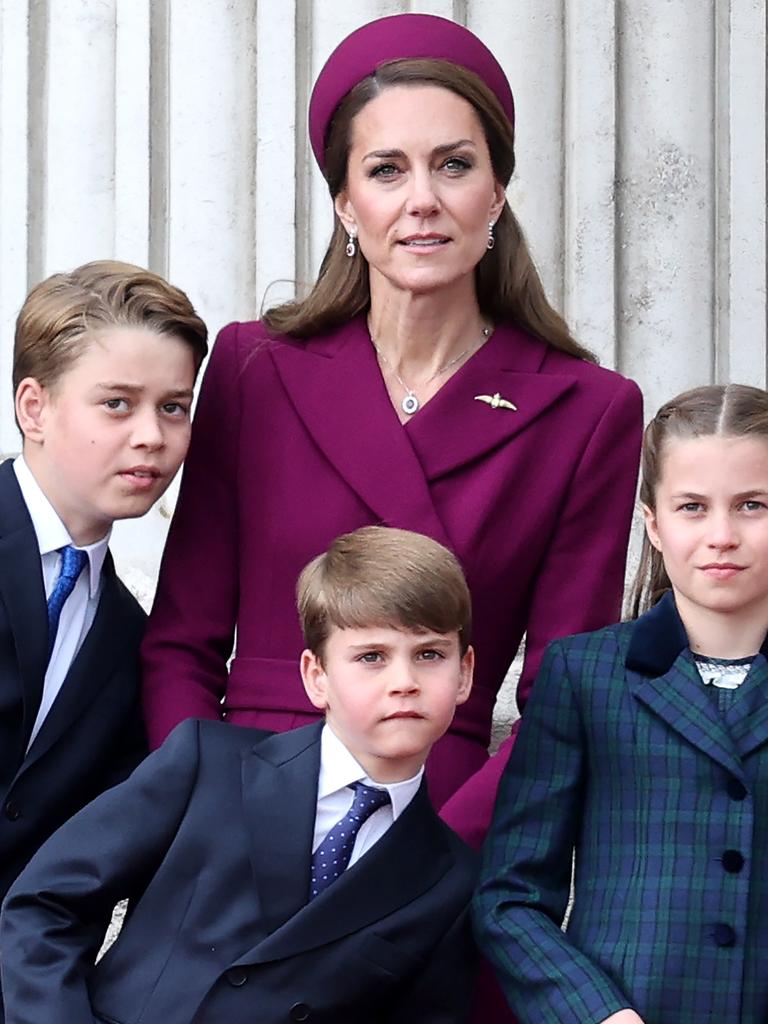 Prince George of Wales, Prince Louis of Wales, Catherine, Princess of Wales and Princess Charlotte of Wales watch the fly-past on the balcony of Buckingham Palace. Picture: Chris Jackson/Getty Images