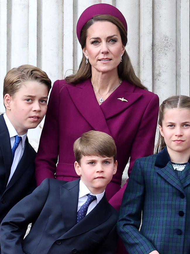 Prince George of Wales, Prince Louis of Wales, Catherine, Princess of Wales and Princess Charlotte of Wales watch the fly-past on the balcony of Buckingham Palace. Picture: Chris Jackson/Getty Images