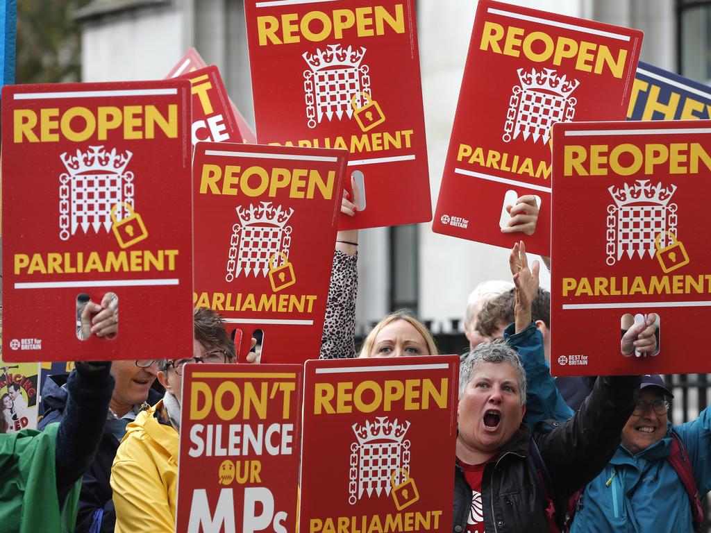 Protesters outside the Supreme Court in London chanted ‘Johnson out’. Picture: AP Photo/Frank Augstein.