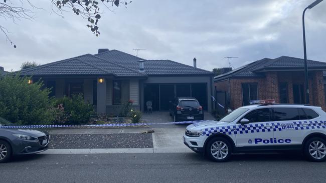 Police outside the Craigieburn home where a man was fatally stabbed on Saturday night. Picture: Euan Kennedy