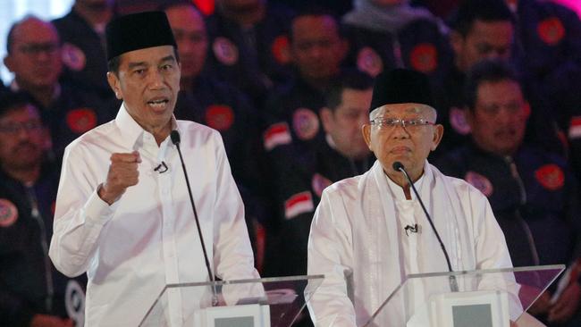 President Joko Widodo and his running mate Ma’aruf Amin during a televised debate last week. Picture: AP