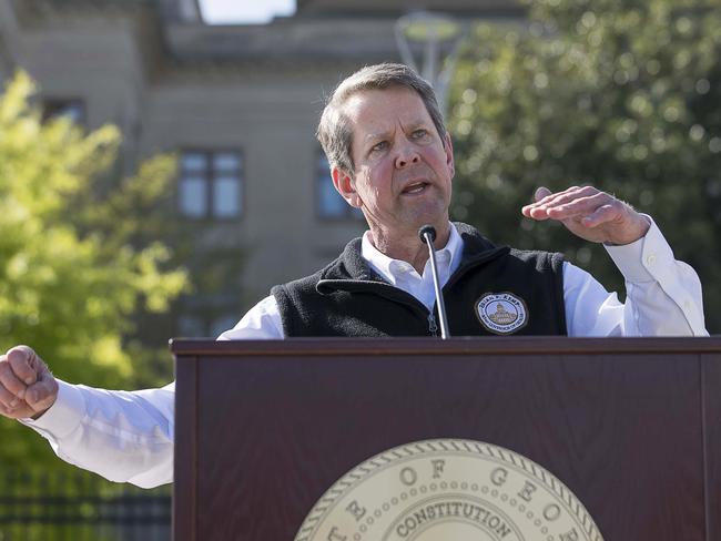 Georgia Governor Brian Kemp tells the world he’s just catching up on the news that this is serious. Picture: AP