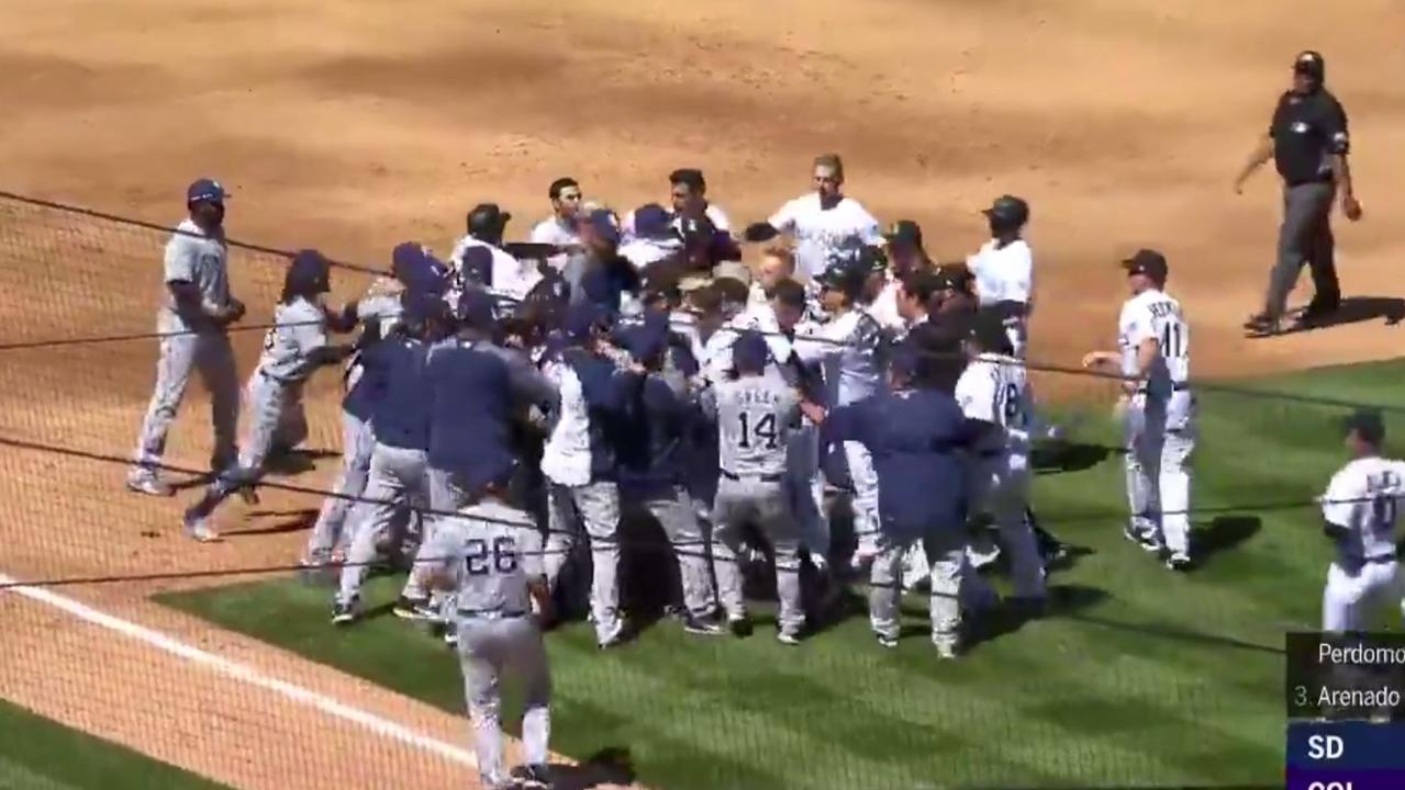 Rockies' Nolan Arenado charges mound after Padres pitcher throws