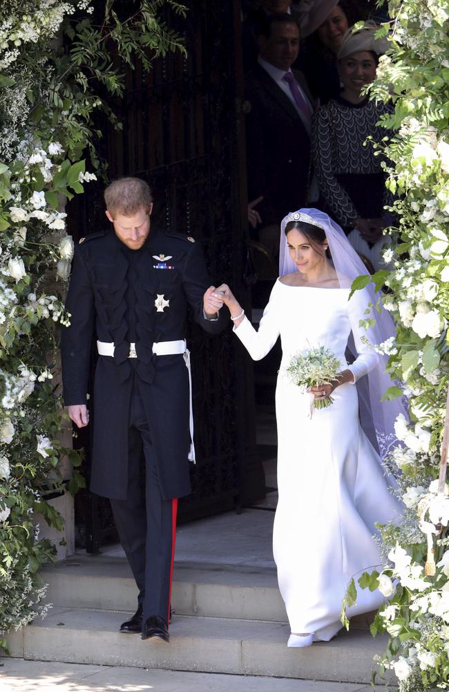 Britain's Prince Harry and Meghan Markle leave after their wedding ceremony. Picture: AP