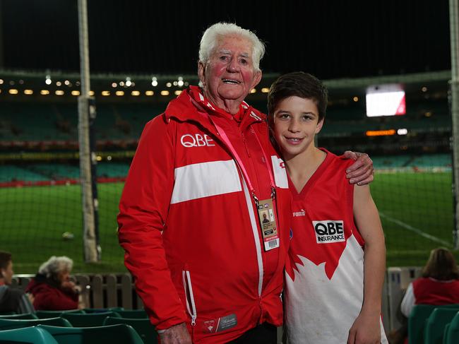 Clovelly's Edyn Harapin, a rising AFL star with his famous Swans supporter grandad Kenny Williams at the Swans V Hawthorn match at the SCG.