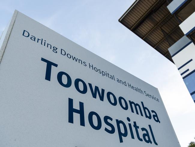 How many Darling Downs Health staff are isolating with Covid-19