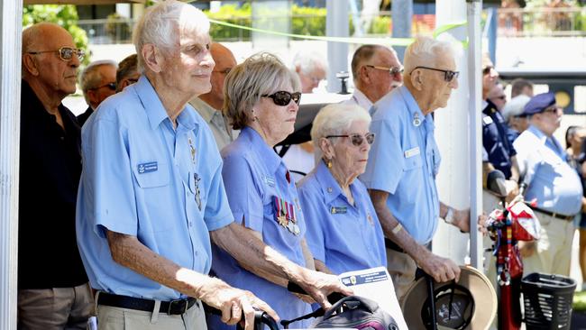 Tony Branbridge, Wendy McCrae, Dawn Hartman and Roy Hartman stand to attention for the playing of the Australian national anthem. Picture: Brendan Radke