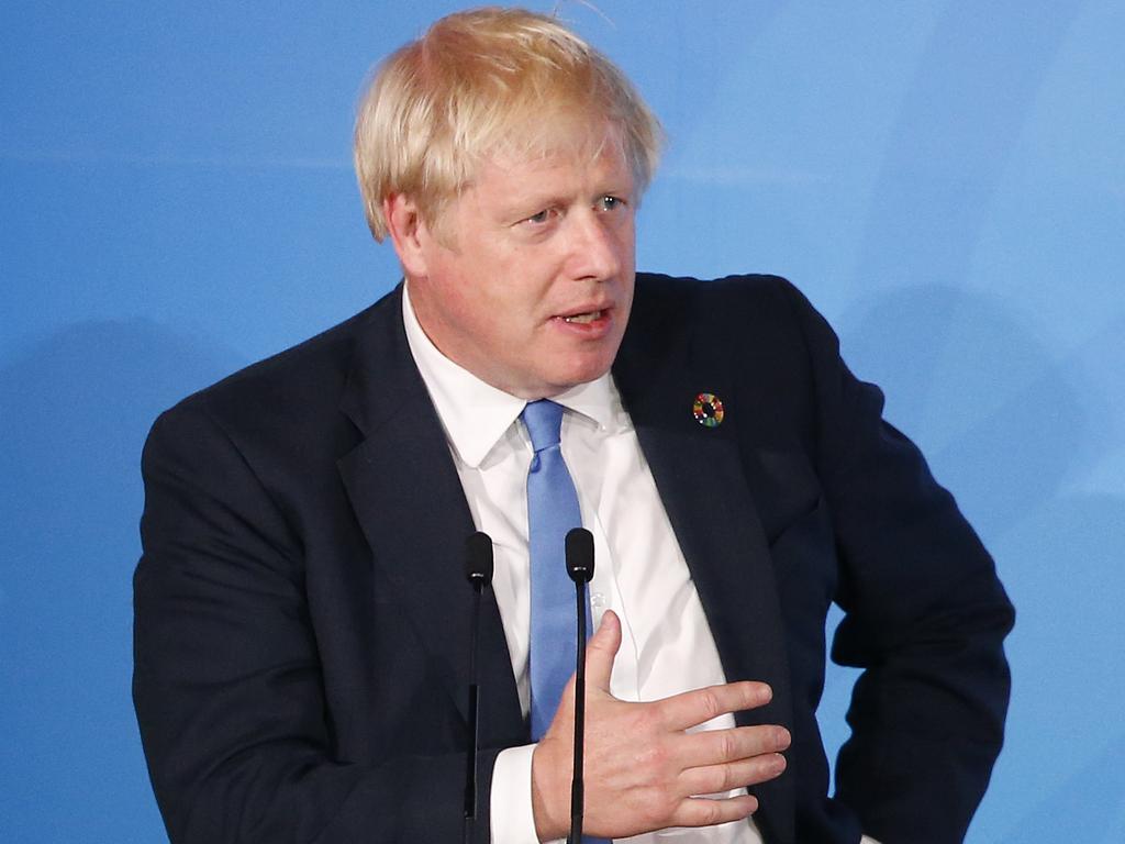 Britain’s Prime Minister Boris Johnson addresses the Climate Action Summit in the United Nations General Assembly, at U.N. headquarters, Monday, Sept. 23, 2019. (AP Photo/Jason DeCrow)