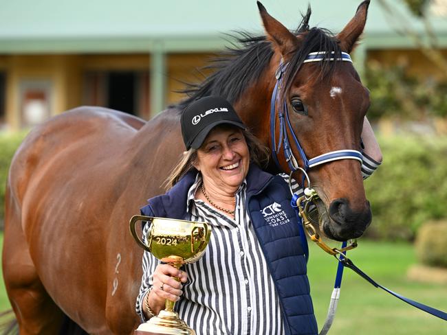 MELBOURNE, AUSTRALIA - NOVEMBER 06: Melbourne Cup winning horse KnightÃ¢â¬â¢s Choice poses with trainer Sheila Laxon during a Melbourne Cup Winner Media Opportunity at Macedon Lodge on November 06, 2024 in Melbourne, Australia. (Photo by Vince Caligiuri/Getty Images)