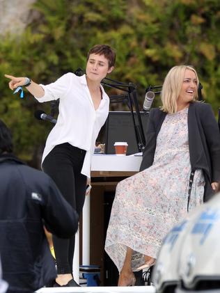 Tessa James jokes with Jackie O at the Justin Bieber concert.