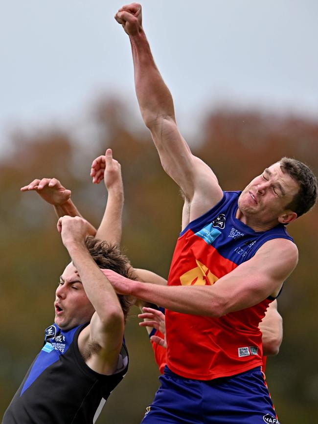 VAFA: Uni Blacks and Fitzroy players vie for the mark. Picture: Andy Brownbill