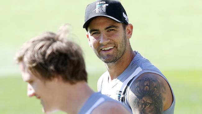 Jared Polec and Chad Wingard walking laps at Power training this year. Picture Sarah Reed