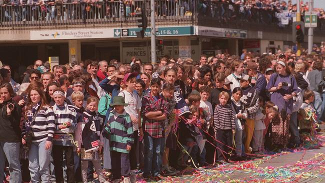 Crowds outside Flinders Street Station during the 1995 AFL Grand Final Parade. Picture: HWT Library.