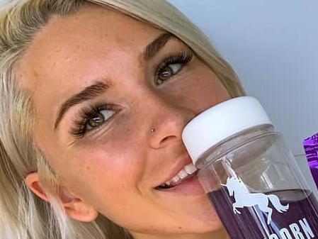 Instagram fitness model Shan Hawkins with Unicorn Water.