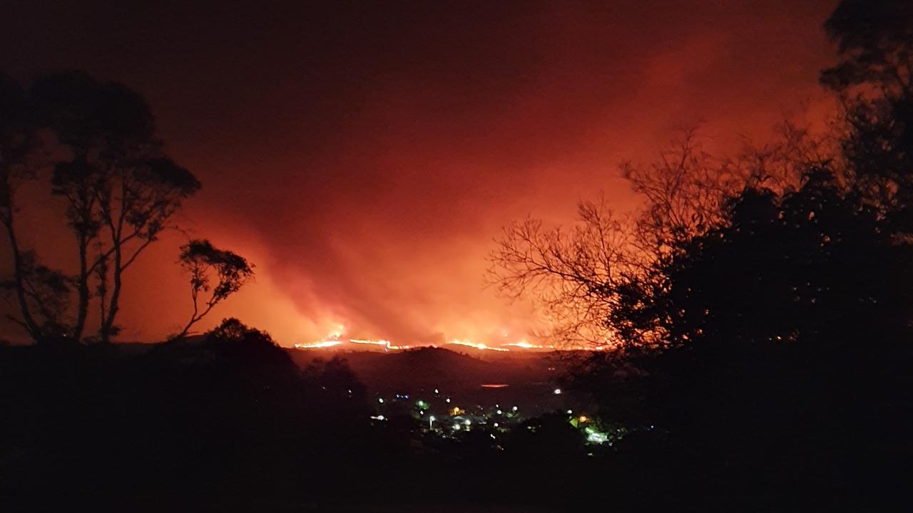 UP IN FLAMES: Corryong just before the fire jumped Mt Mittamatite in the early hours of New Year’s Eve.