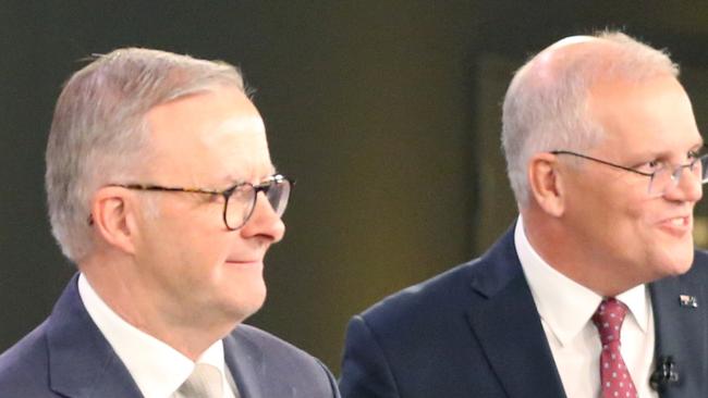 Anthony Albanese and Scott Morrison leave the debate, speaking at the People's Forum, a Scott Morrison and Anthony Albanese debate, Woolloongabba, Brisbane on Wednesday April 20th 2022 - Photo Steve Pohlner