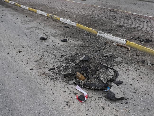 An unexploded shell is seen on a road on April 5, 2022 in Bucha, Ukraine. Picture: Alexey Furman/Getty Images