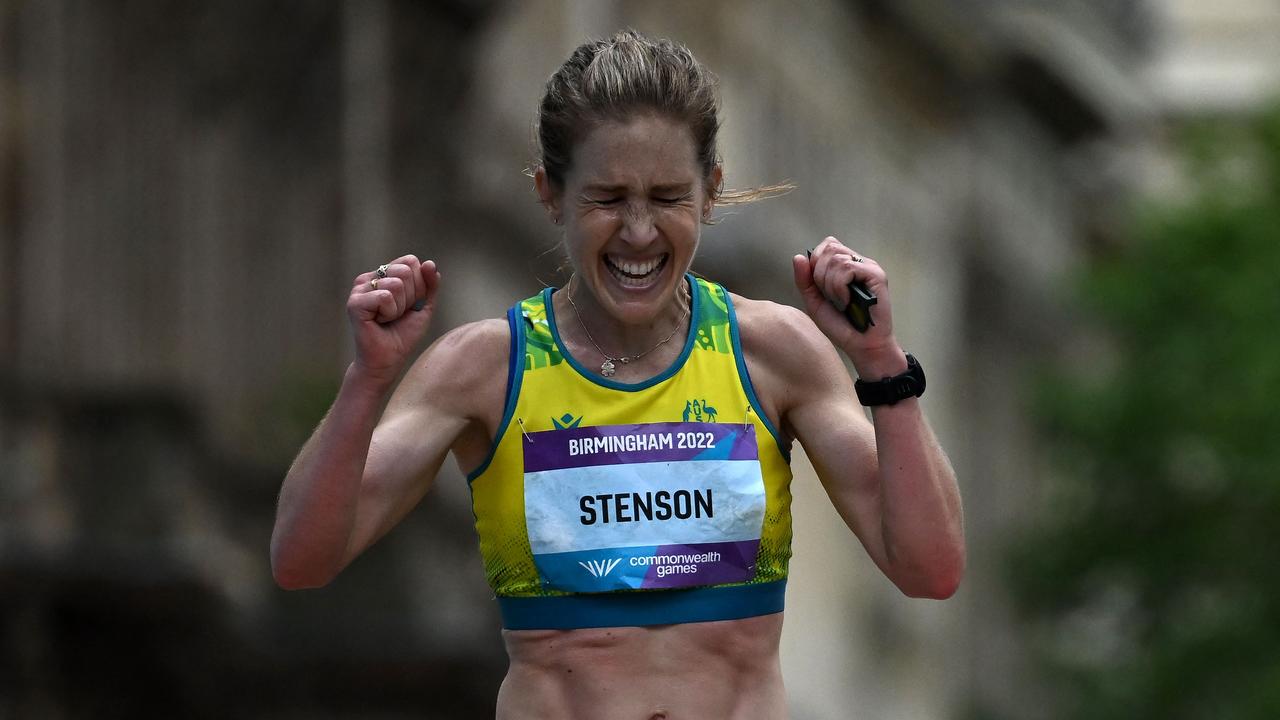 Gold medallist Australia's Jessica Stenson celebrates winning and taking the gold medal in the women's Marathon final on day two of the Commonwealth Games at Smithfield in Birmingham, central England, on July 30, 2022. (Photo by Ben Stansall / AFP)