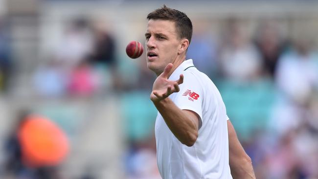 (FILES) In this file photo taken on July 30, 2017 South Africa's Morne Morkel takes the ball as he prepares to bowl during play on day 4 of the third Test match between England and South Africa at The Oval cricket ground in London. South African fast bowler Morne Morkel announced on February 26, 2018 that he would retire from international cricket after the four-Test series against Australia which starts at Kingsmead on Thursday / AFP PHOTO / Glyn KIRK / RESTRICTED TO EDITORIAL USE. NO ASSOCIATION WITH DIRECT COMPETITOR OF SPONSOR, PARTNER, OR SUPPLIER OF THE ECB